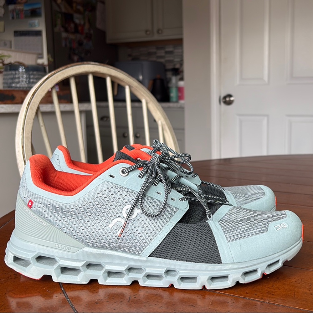 On Running Athletic Shoes in Light Blue and Orange